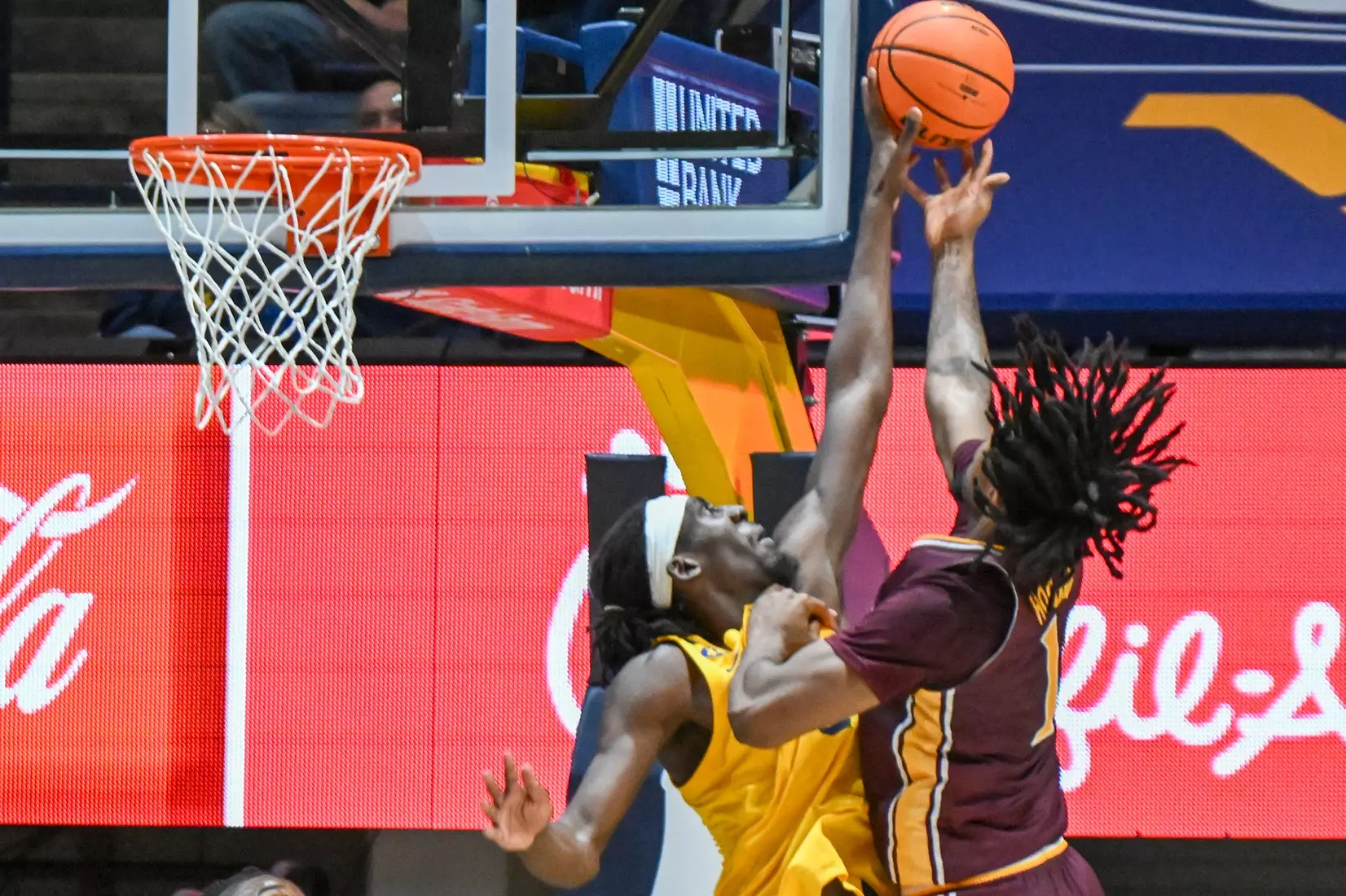 WVU vs Iona action Wednesday night at the WVU Coliseum.