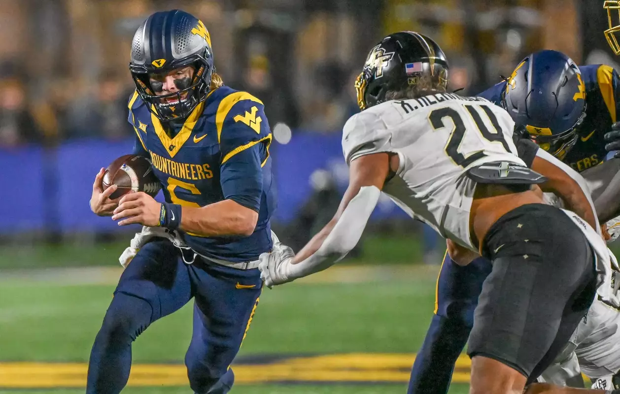 Garrett Greene rushes for yardage.