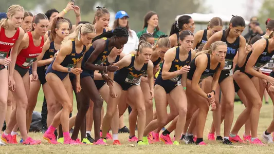 Cross Country team at Big 12 start line