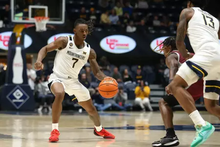 West Virginia Mountaineers guard Javon Small (7) protects the ball on Tuesday, December 10, 2024 William Wotring