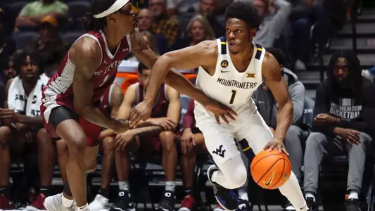 West Virginia Mountaineers guard Joseph Yesufu (1) drives to the net on Tuesday, December 10, 2024 William Wotring