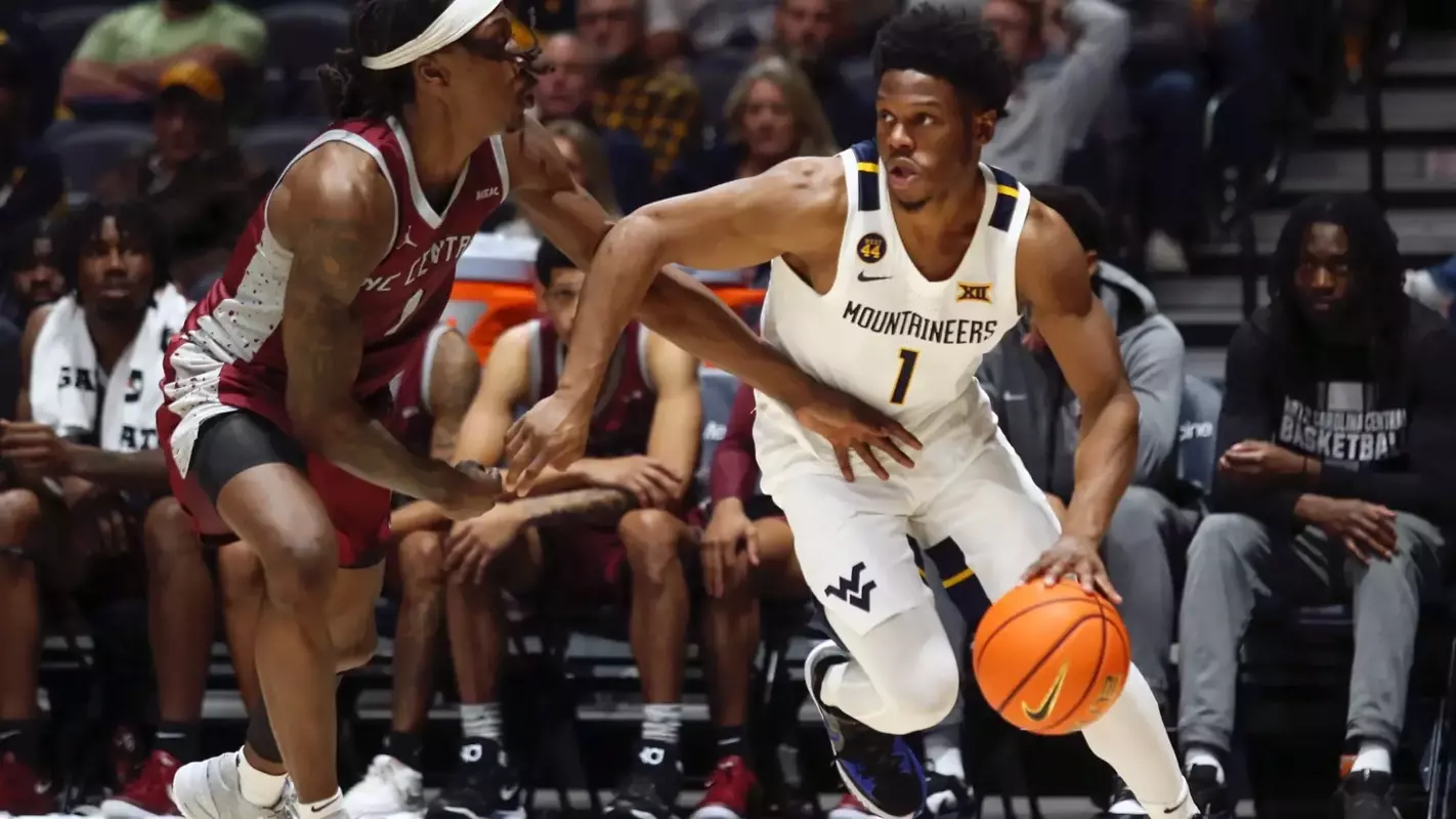 West Virginia Mountaineers guard Joseph Yesufu (1) drives to the net on Tuesday, December 10, 2024 William Wotring
