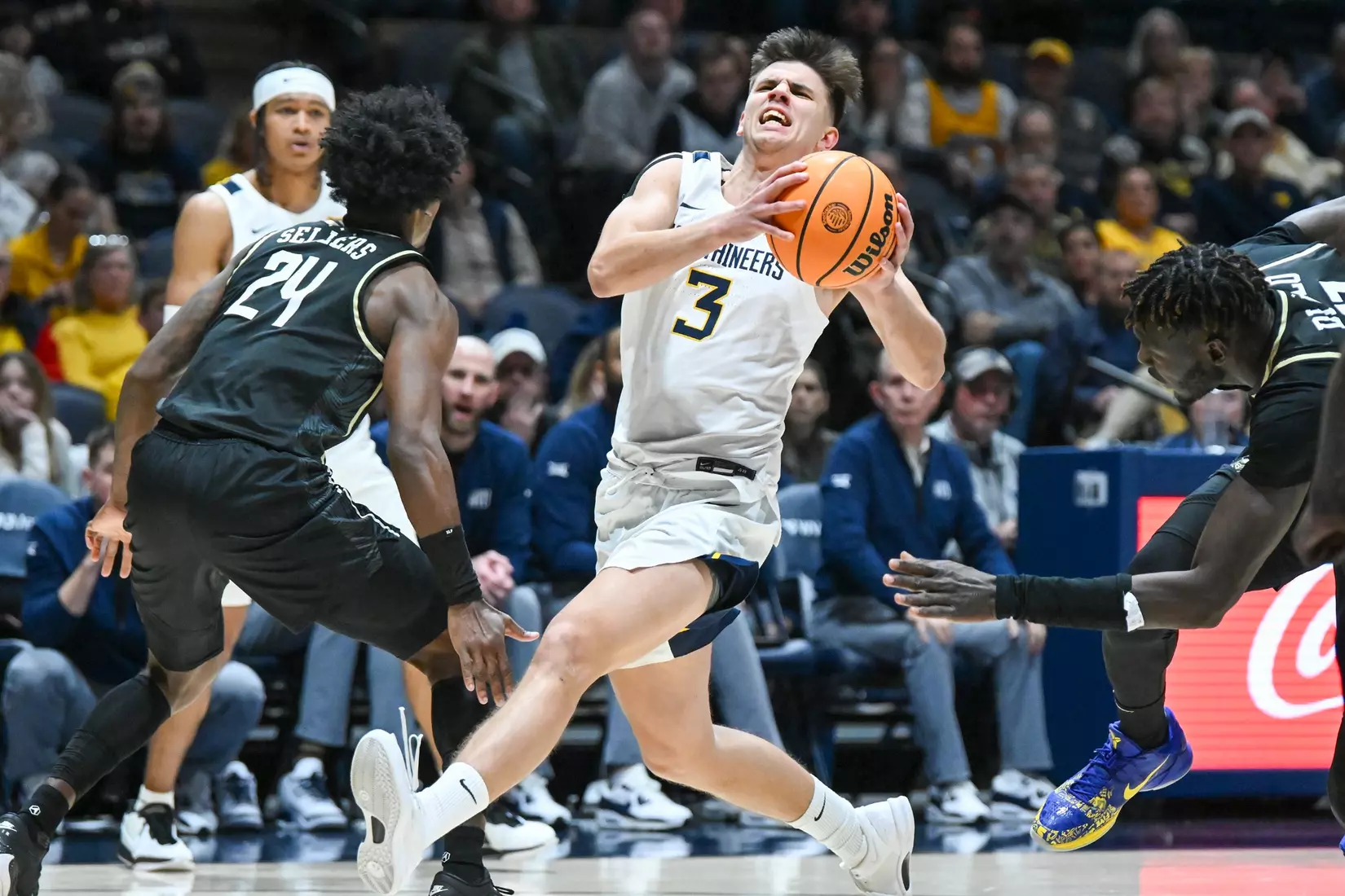 Kerr Kriisa goes for the layup.