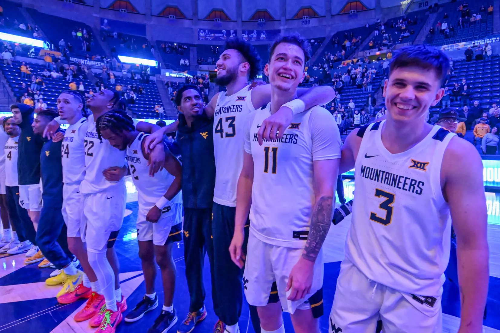 A smiling Quinn Slazinski and Kerr Kriisa sing Country Roads.