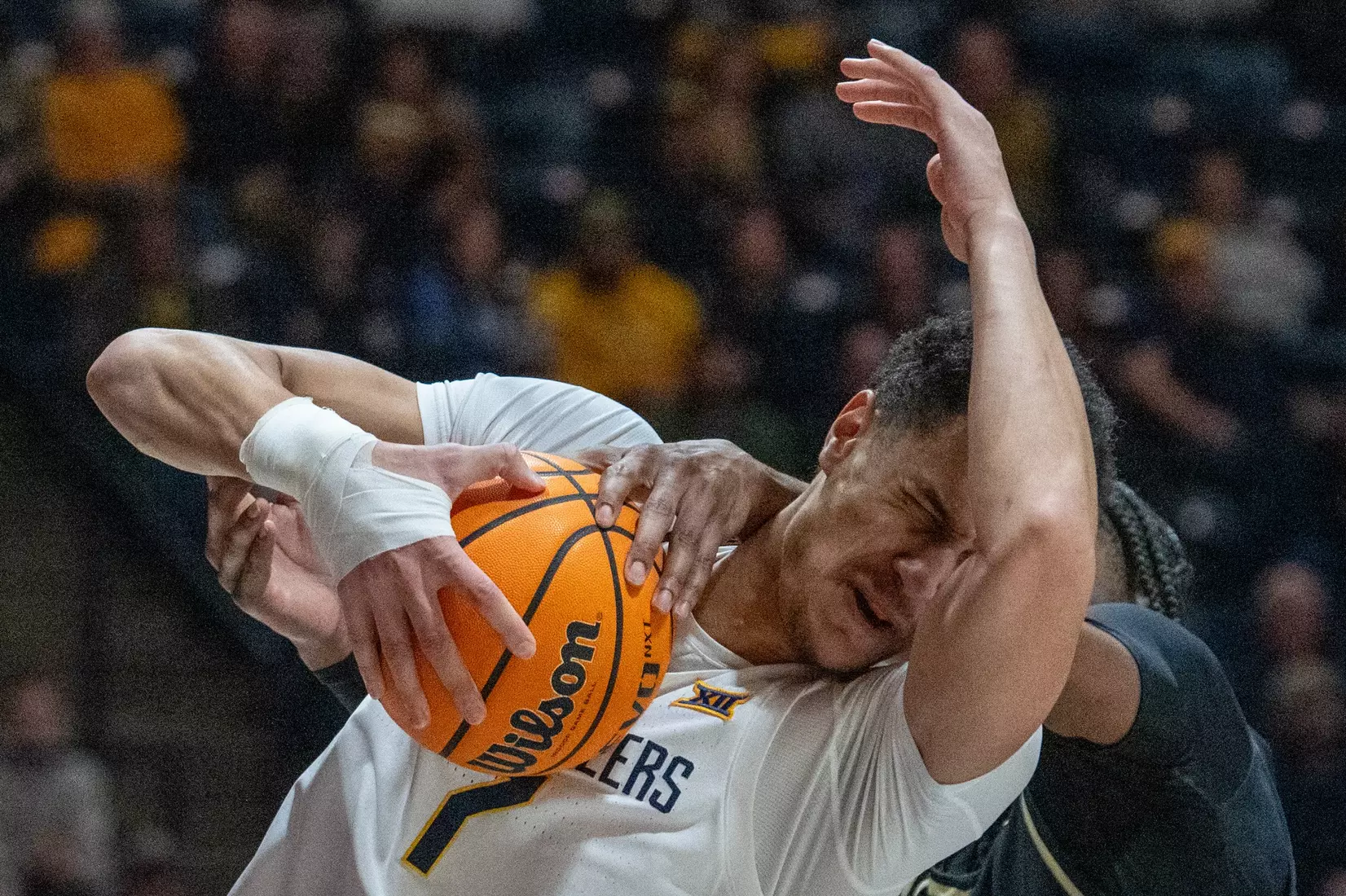 Jesse Edwards is fouled while attempting a shot.