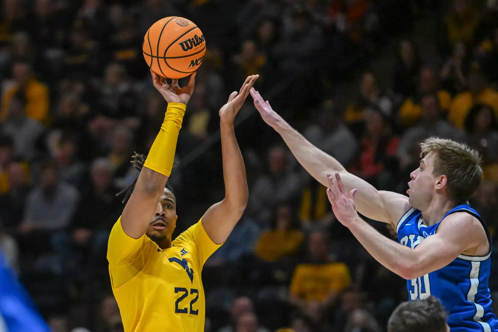 Josiah Harris hits a three.