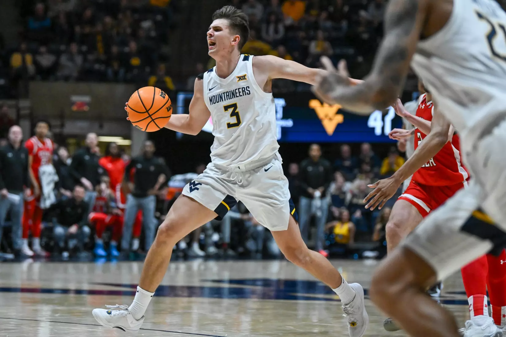 Kerr Kriisa is fouled while driving.