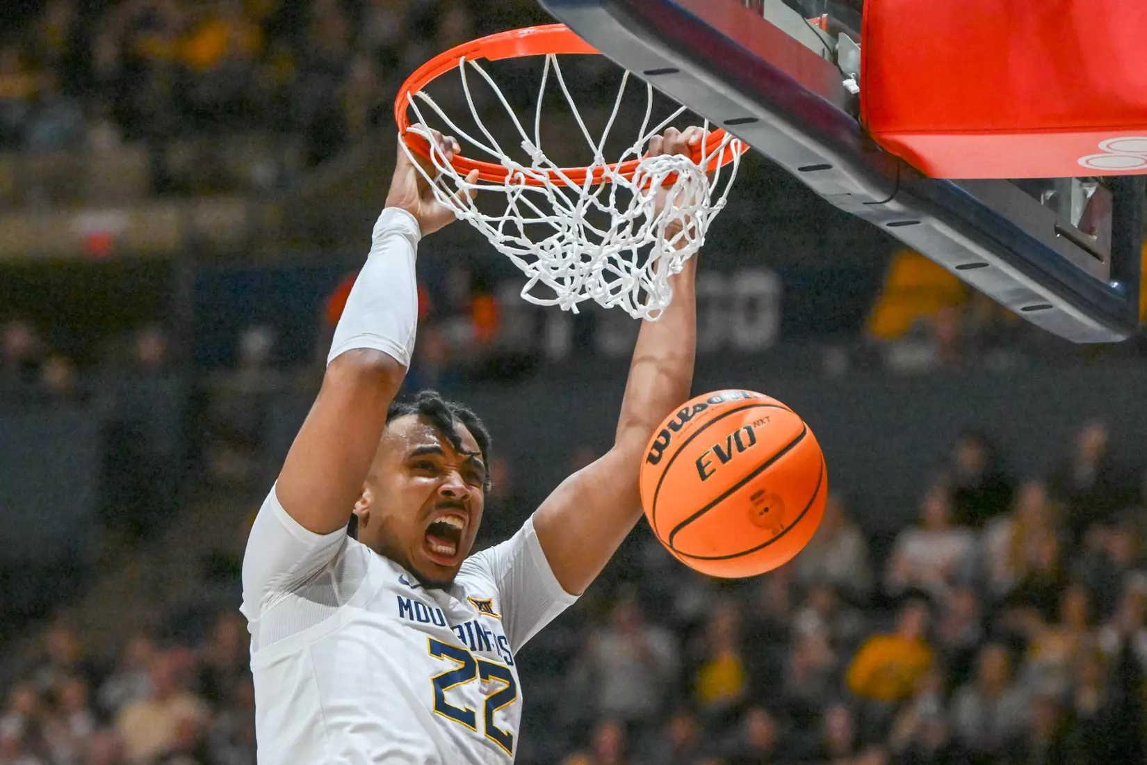 Josiah Harris slam dunks.