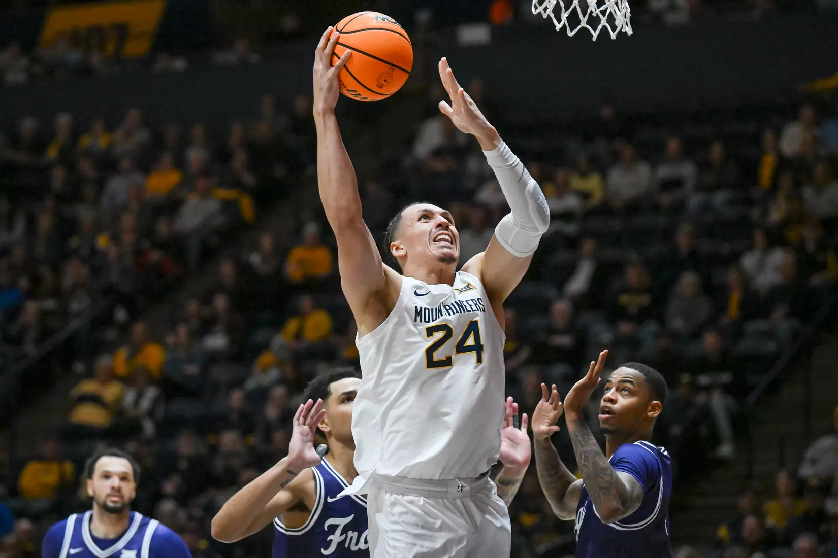 Patrick Suemnick shoots for two.