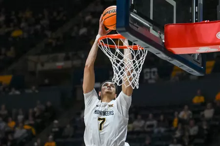 Jesse Edwards slams for two.