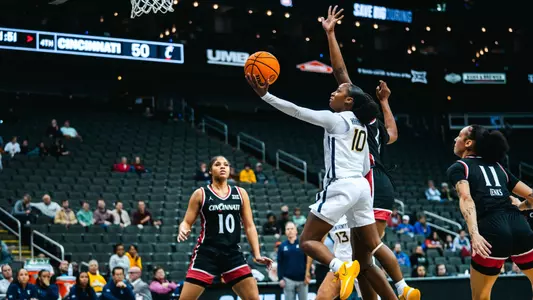 Jordan Harrison attempting a layup