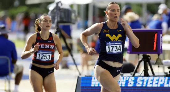 Mikenna Vanderheyden running the steeplechase