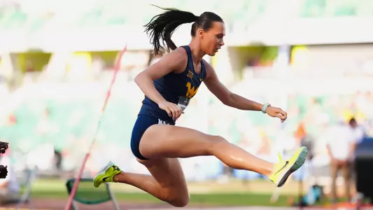 Mikenna Vanderheyden jumping in the steeplehase