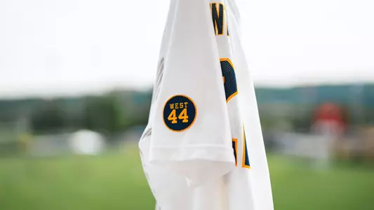 Women's soccer jersey featuring Jerry West logo