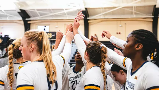 Volleyball team huddle