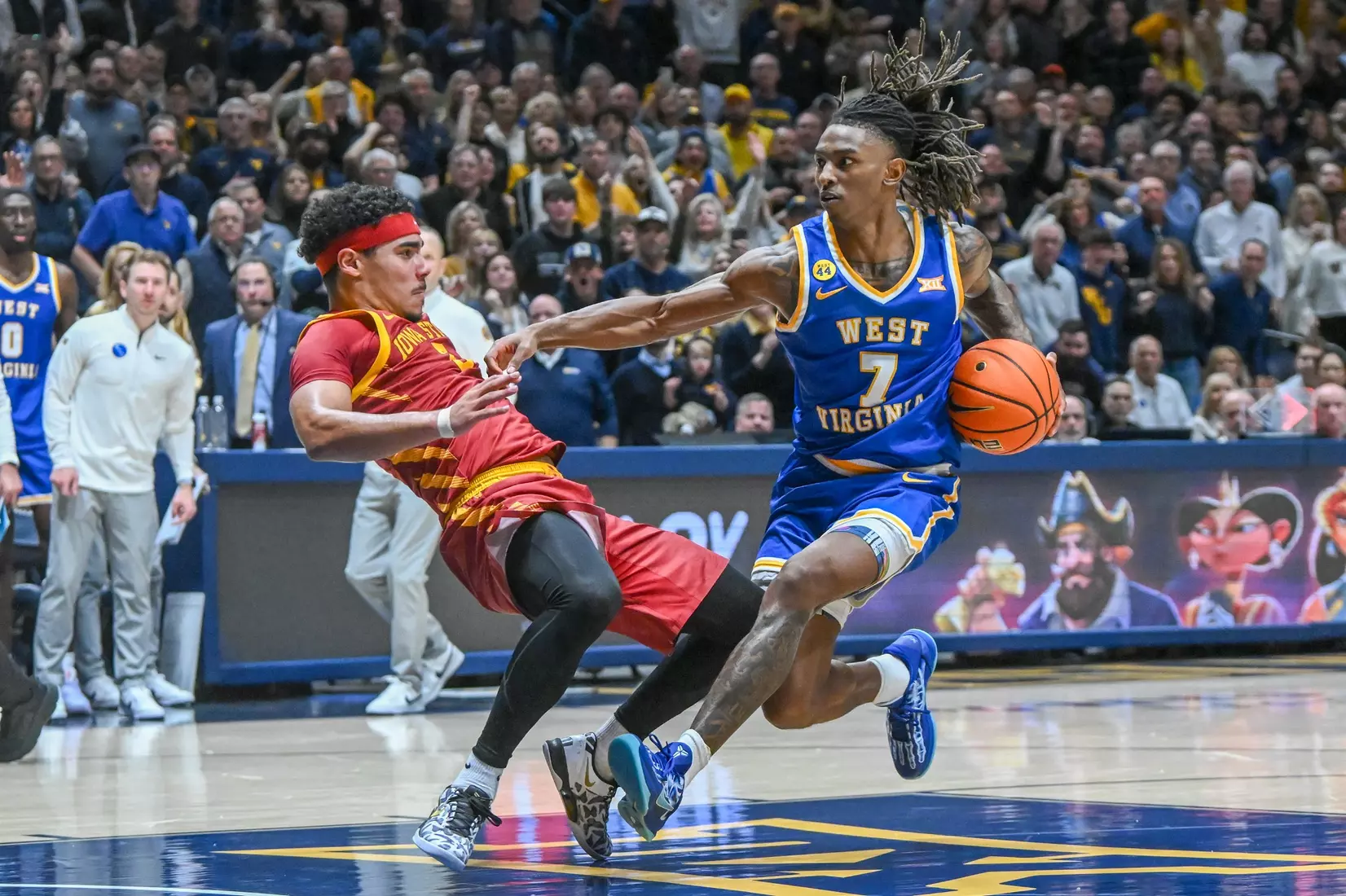 Javon Small is fouled while driving to the basket.