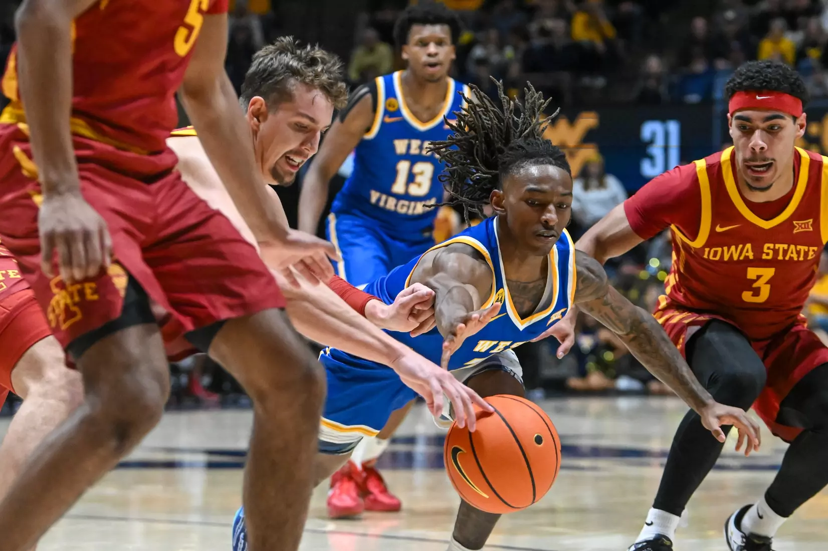 Javon Small dives for the loose ball.