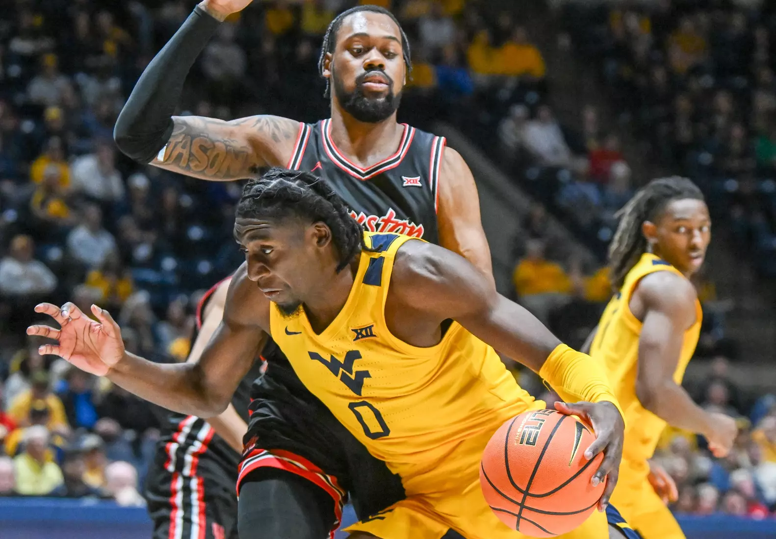 Eduardo Andre drives to the hoop.