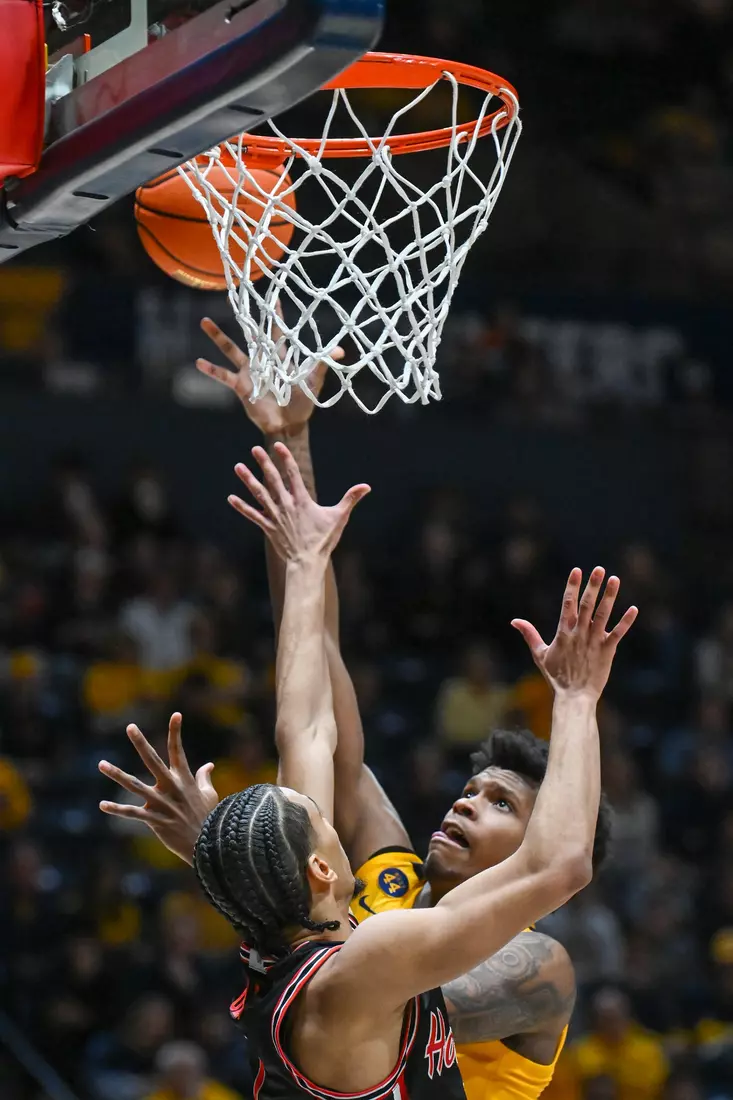 Amani Hansberry scores a basket.