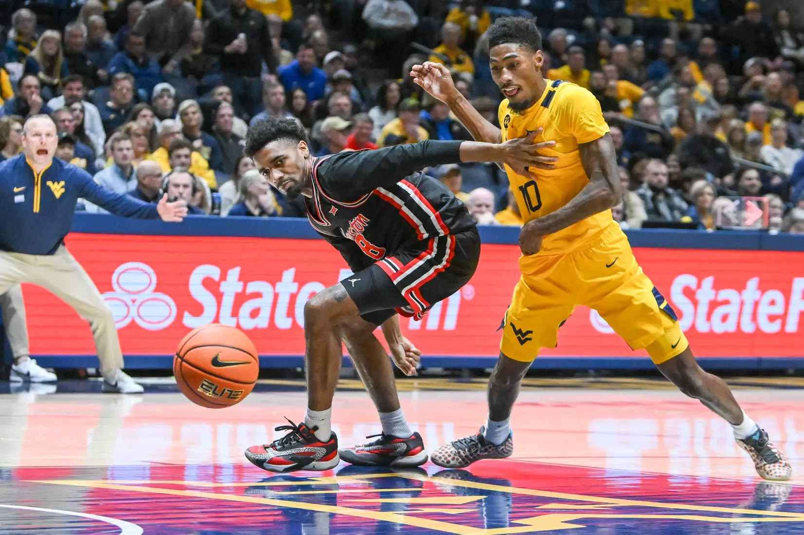 Sencire Harris gets the steal under the basket.