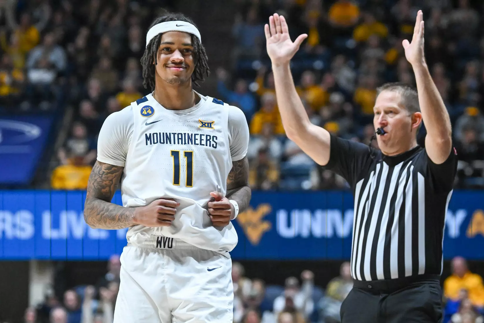 Jonathan Powell is all smiles after hitting a three-pointer during second half action against Oklahoma St.