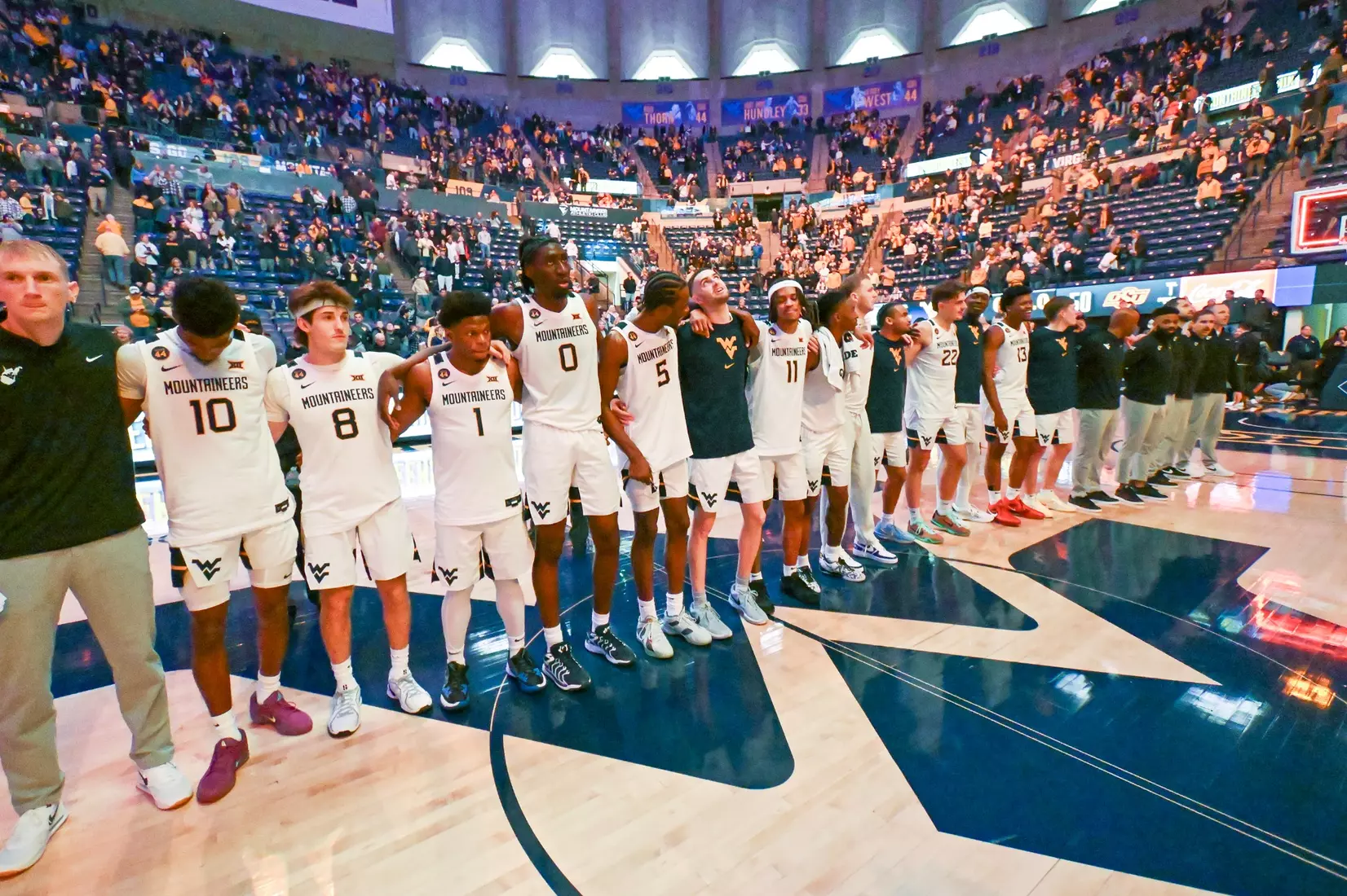 The Mountaineers sing Country Roads following the win over Oklahoma St.