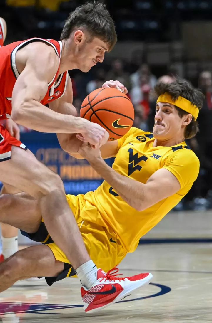 Jake Auer fights for a loose ball.