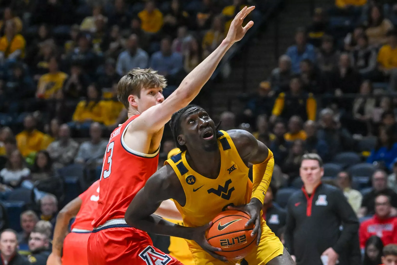 Eduardo Andre works his way to the basket.