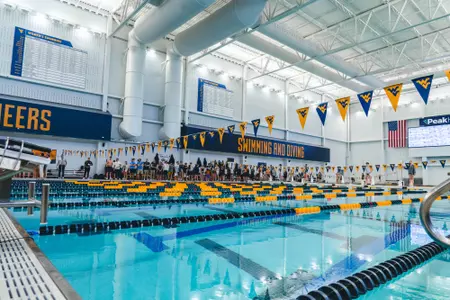 The West Virginia University men's and women's swimming and diving teams host the WVU Invitational on Nov. 20, 2025, at The Peak Health Aquatic Center at Mylan Park in Morgantown, W.Va.