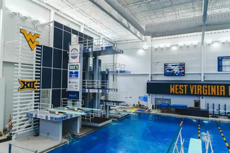 The West Virginia University men's and women's swimming and diving teams host the WVU Invitational on Nov. 20, 2025, at The Peak Health Aquatic Center at Mylan Park in Morgantown, W.Va.