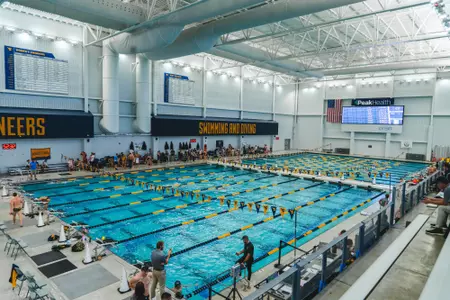 The West Virginia University men's and women's swimming and diving teams host the WVU Invitational on Nov. 20, 2025, at The Peak Health Aquatic Center at Mylan Park in Morgantown, W.Va.