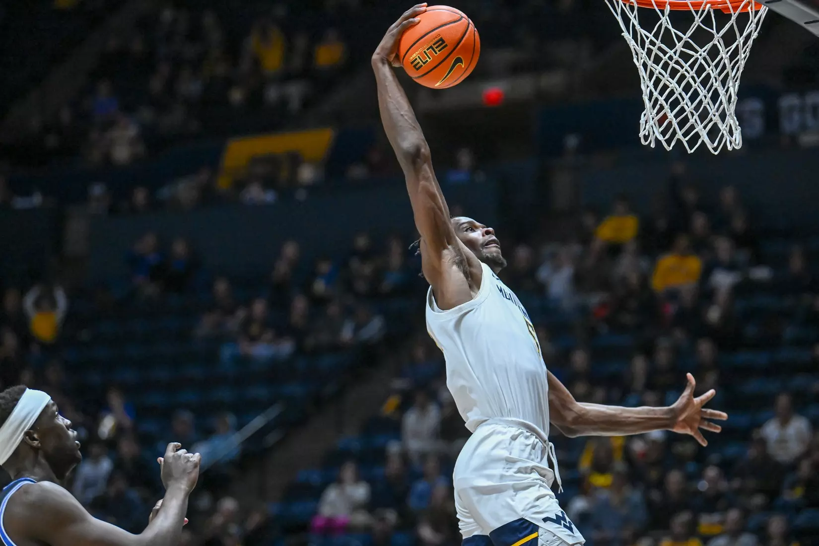 Toby Okani slams for two points.