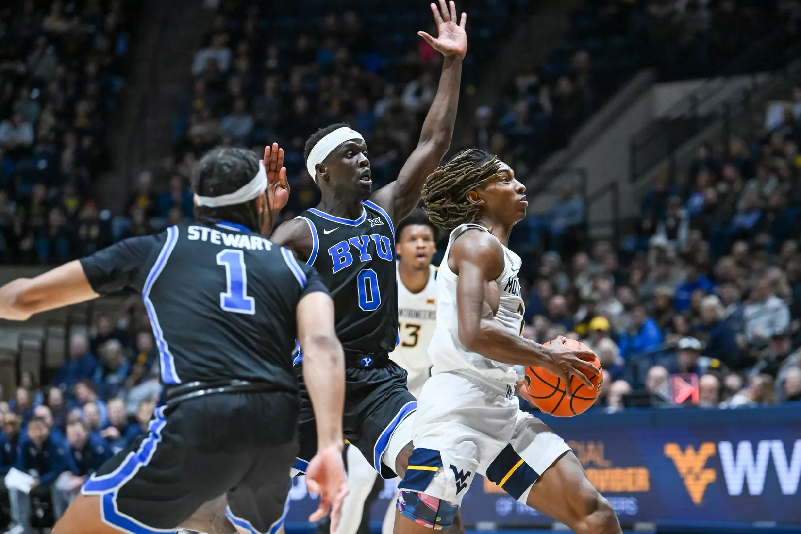 Javon Small drives to the hoop.