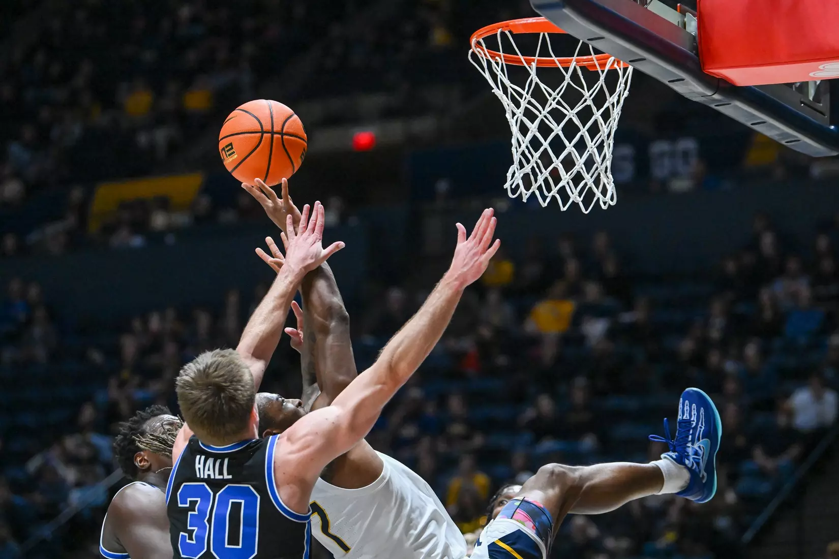 Javon Small is fouled on his way to the basket.