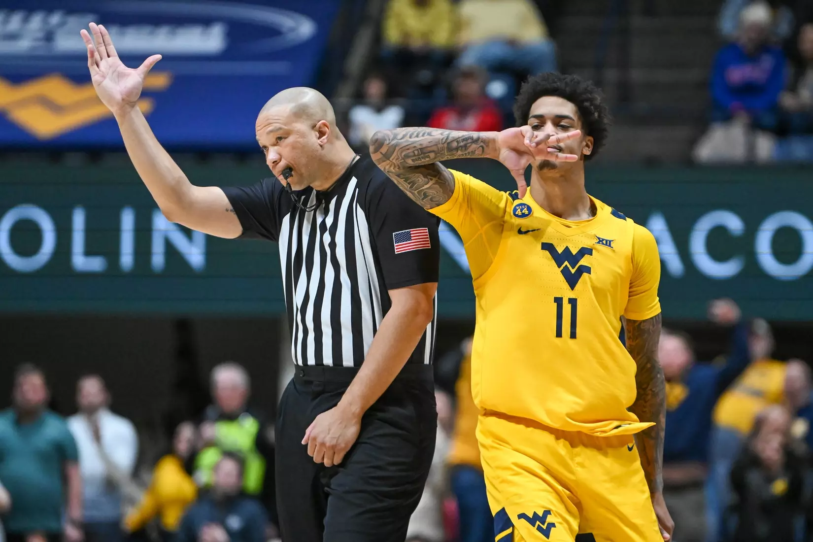 Jonathan Powell celebrates a three-pointer.