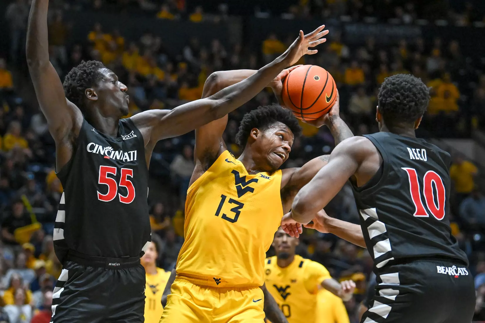 Amani Hansberry fights for a rebound.