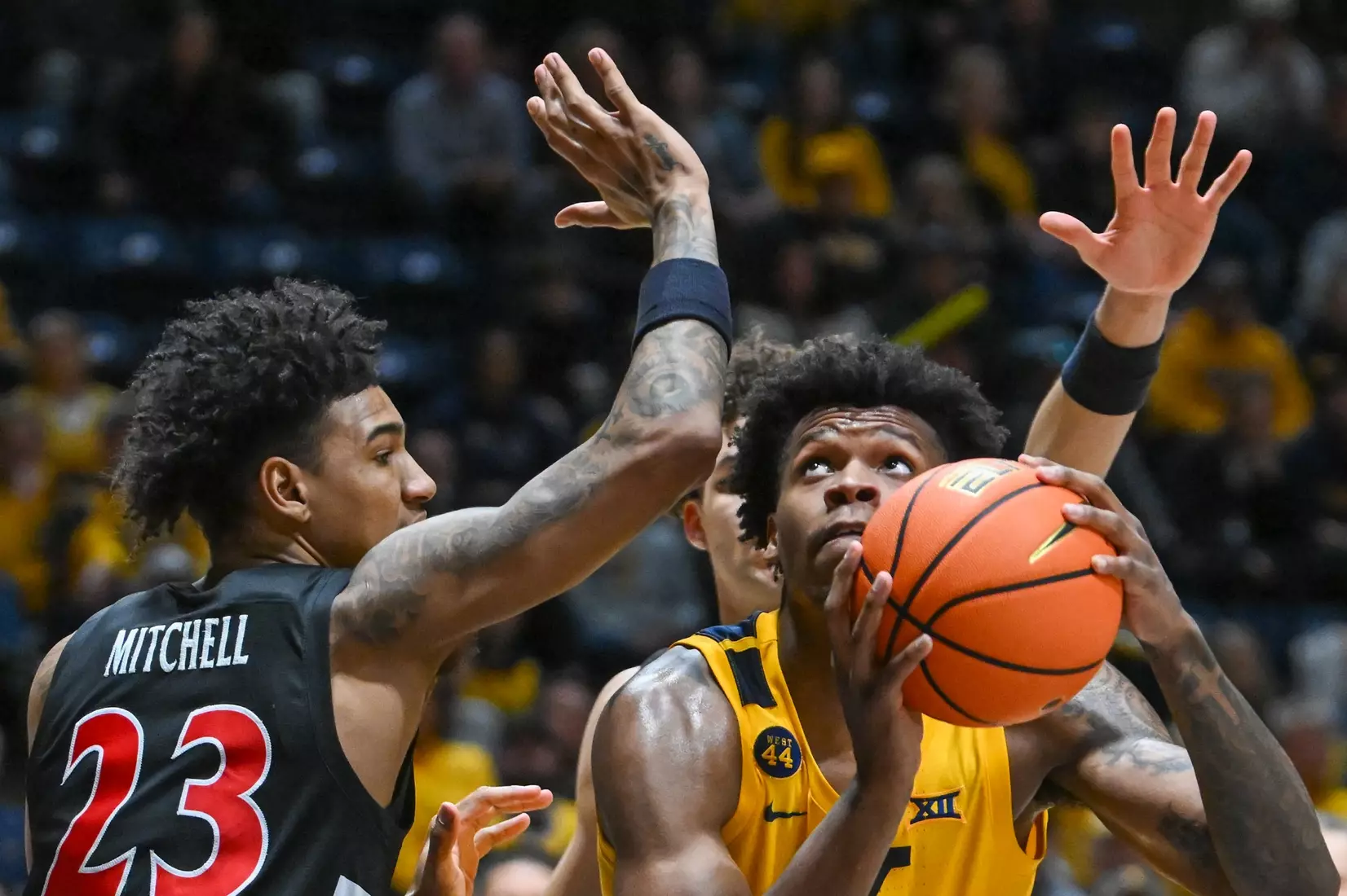 Amani Hansberry looks to shoot.