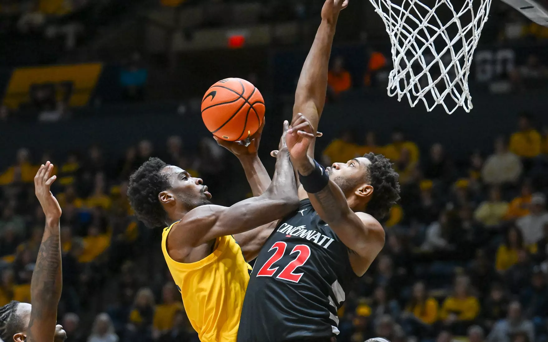 Toby Okani shoots for two points.