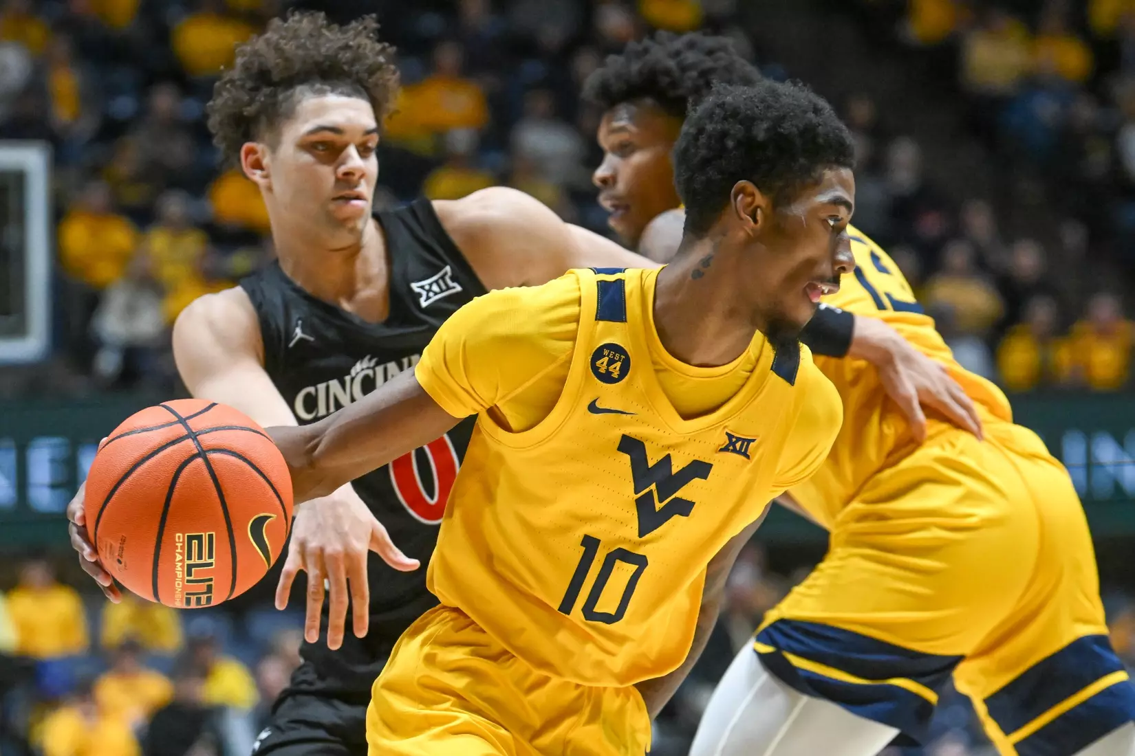Sencire Harris drives around a defender.