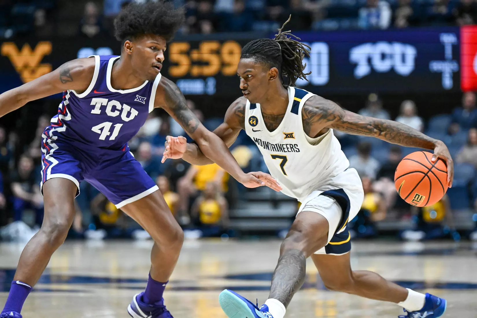 Javon Small drives to the basket.