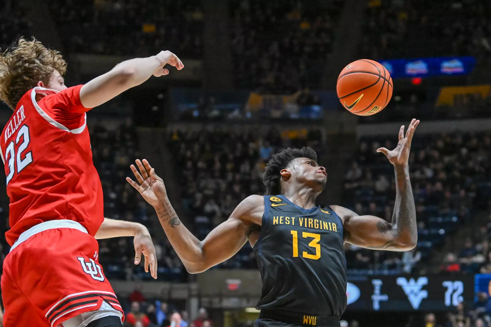 Amani Hansberry goes for the rebound.