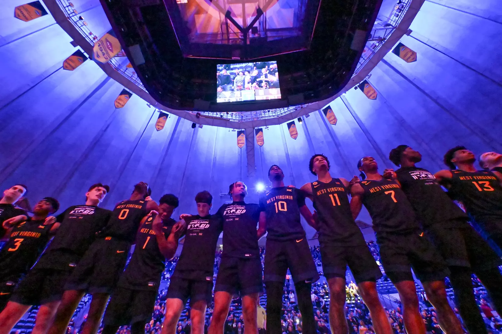 The Mountaineers celebrate the win over Utah.