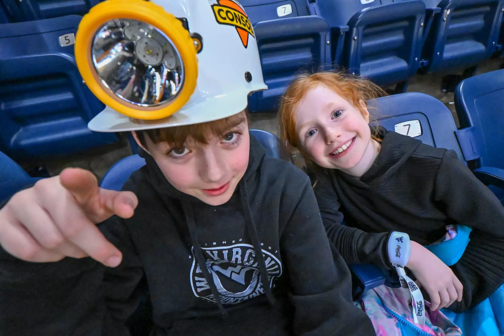 Super fans Joseph and Anna Nugent cheered on the Mountaineers for Coal Rush Night at the WVU Coliseum.