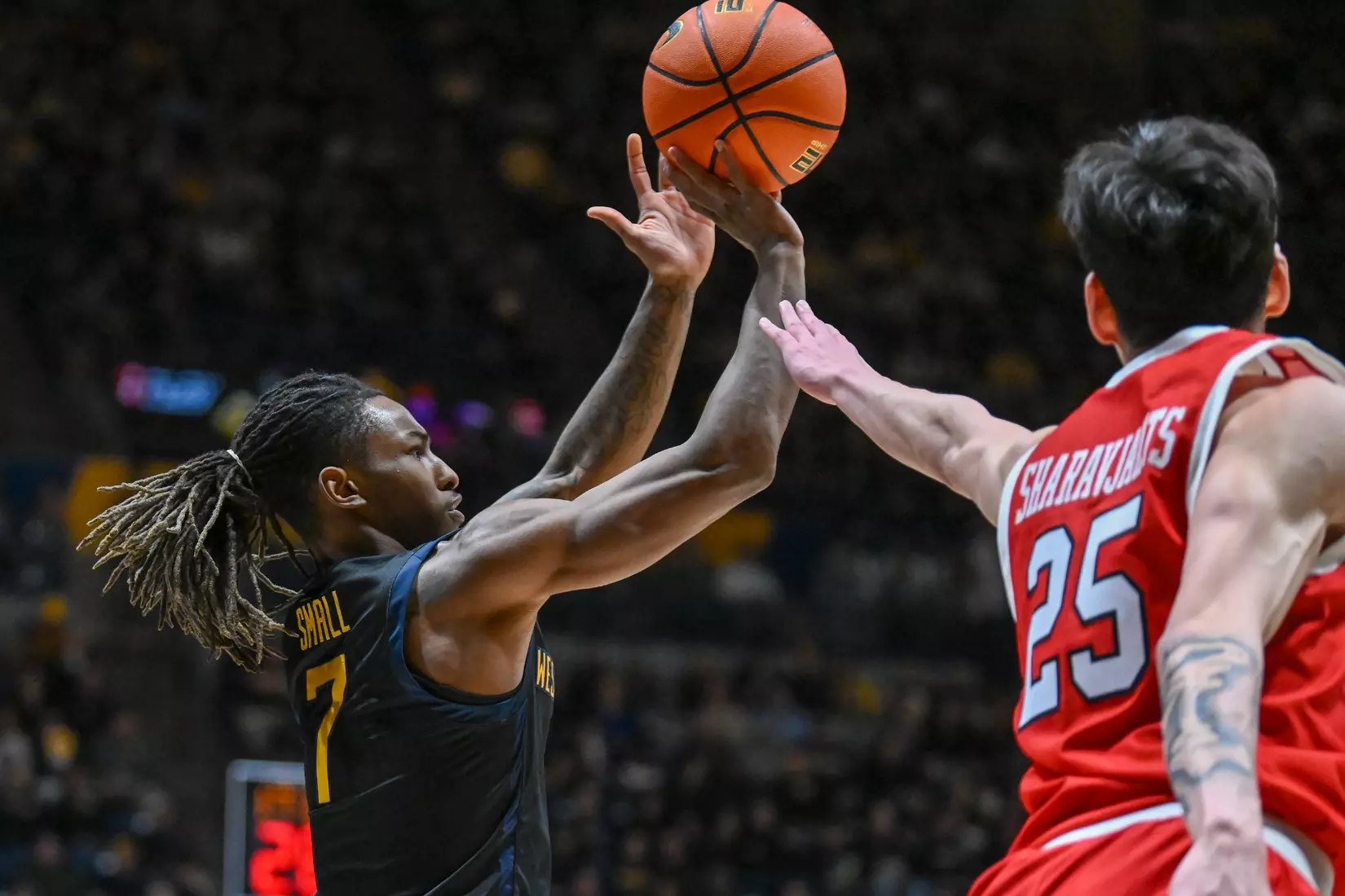 Javon Small hits a three-pointer.