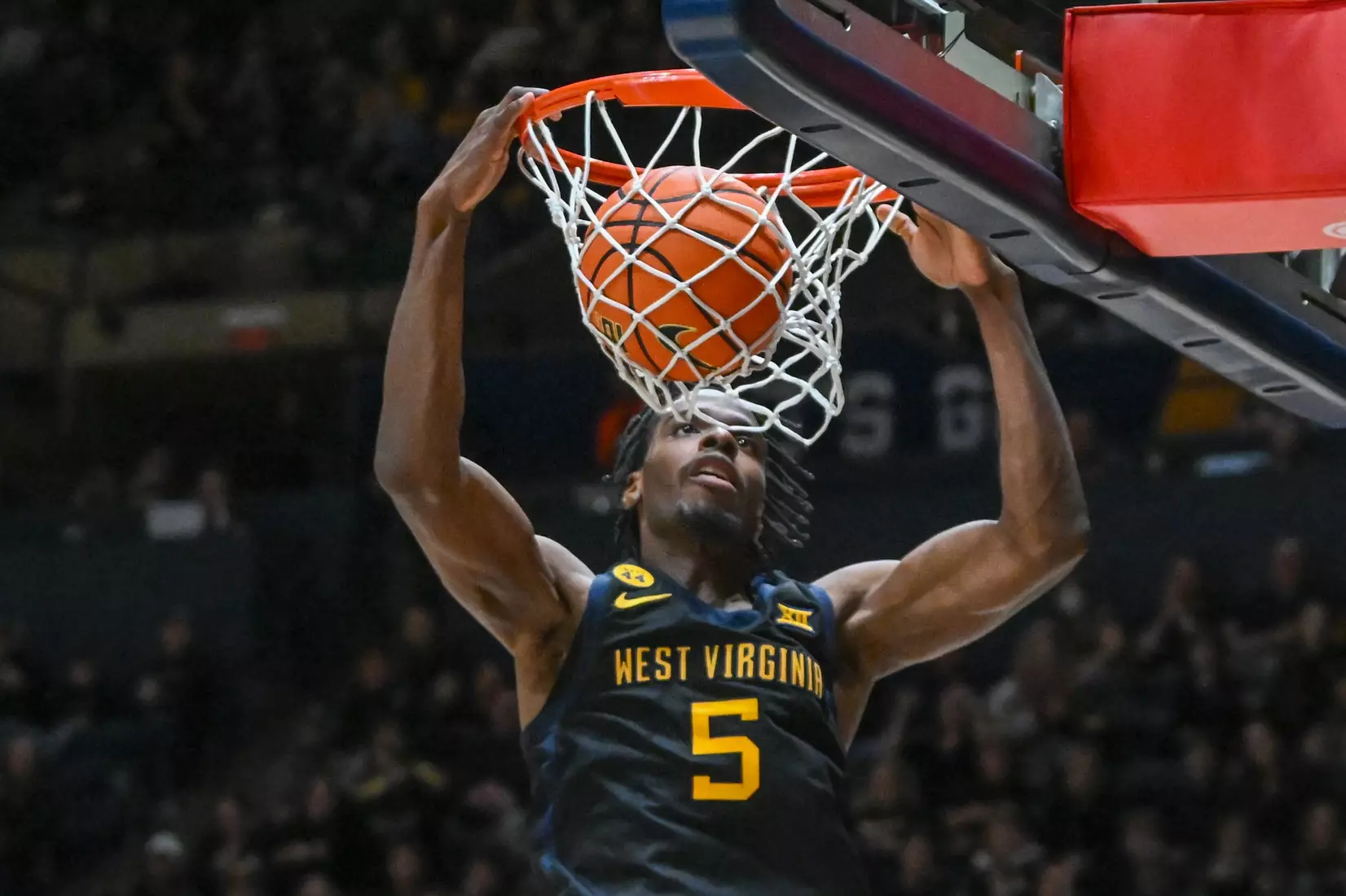 Toby Okani slams for two points.