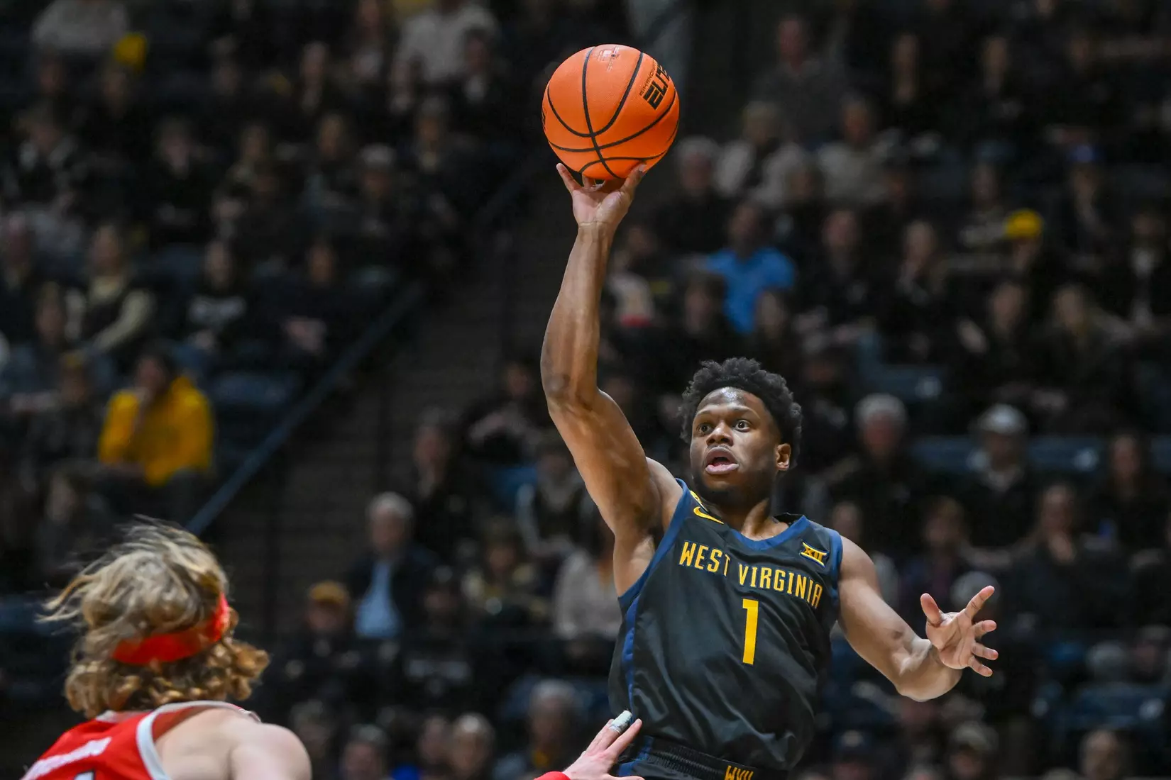 Joseph Yesufu shoots the floater for two points.
