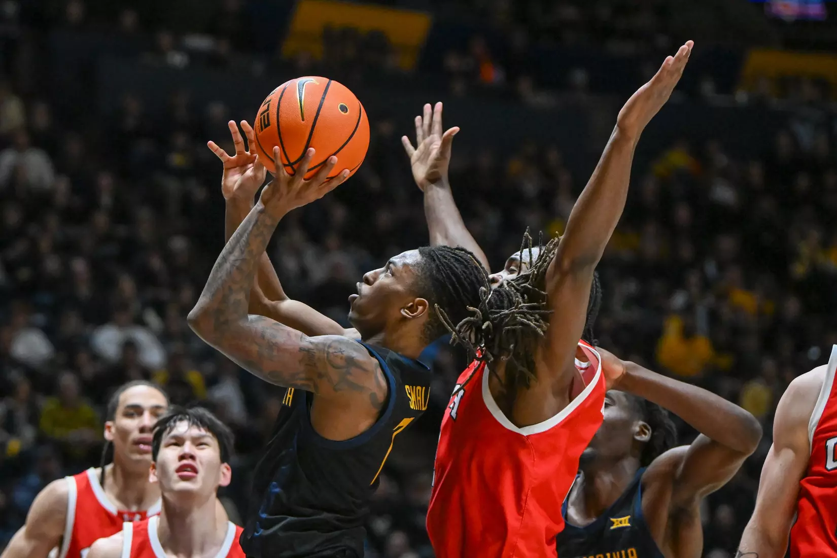 Javon Small shoots for two in the lane.