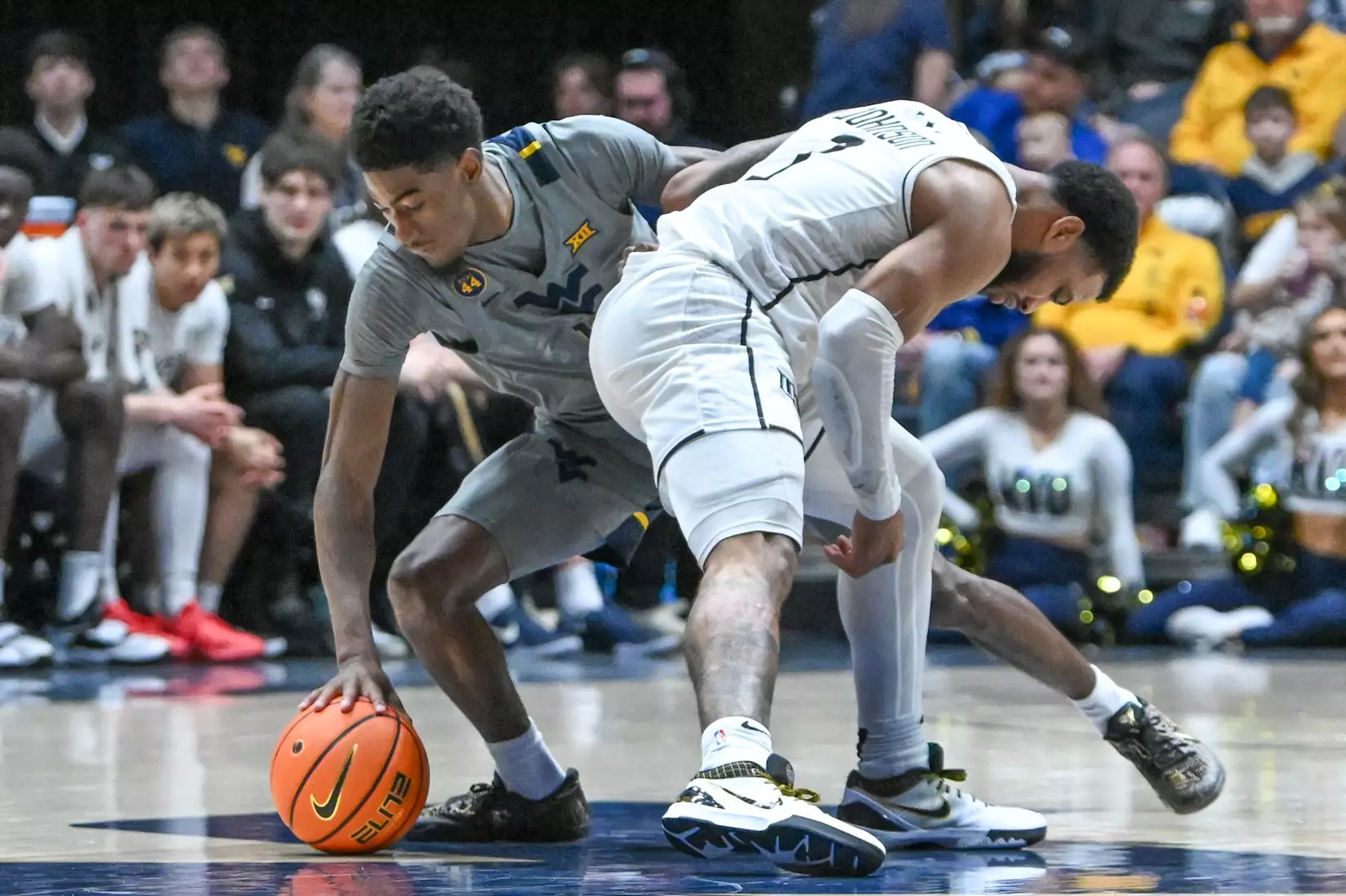 Sencire Harris gets the steal and is called for a foul in the process.