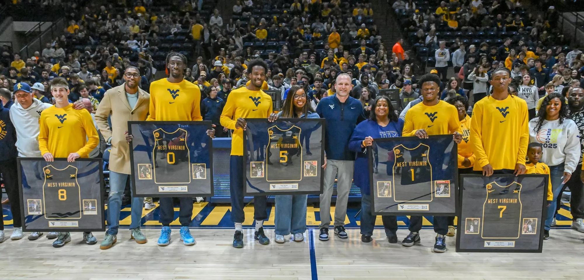 Coach Darian DeVries and his senior class.