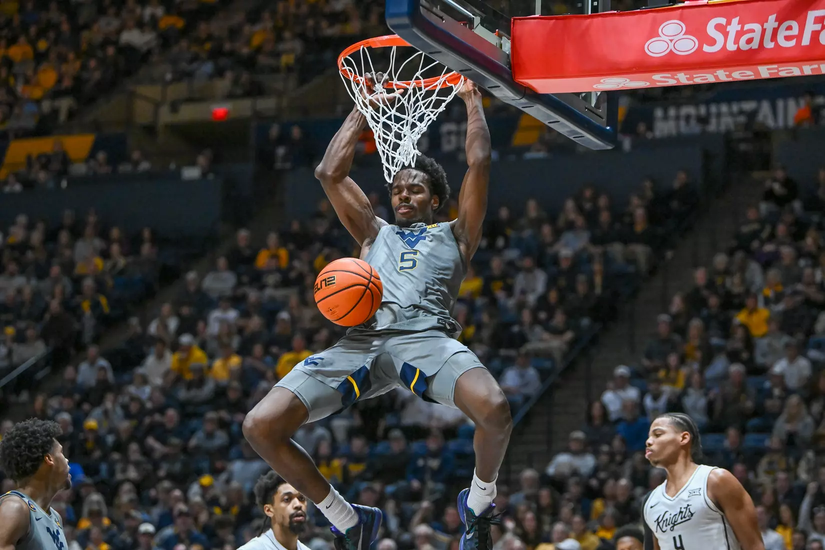 Toby Okani slams for two.